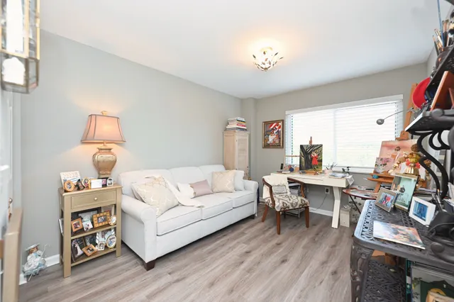 a workspace with furniture and window