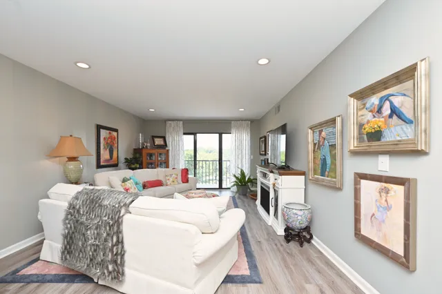 a bed room with a bed and wooden floor