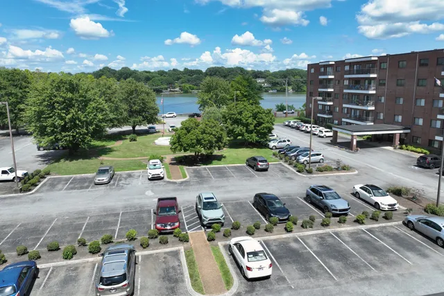 a bathroom with a toilet a sink and shower
