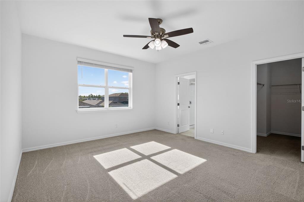 810 MIDDLETON Street DeBary, FL 32713 - Photo 24 of 52 an empty room with closet and windows
