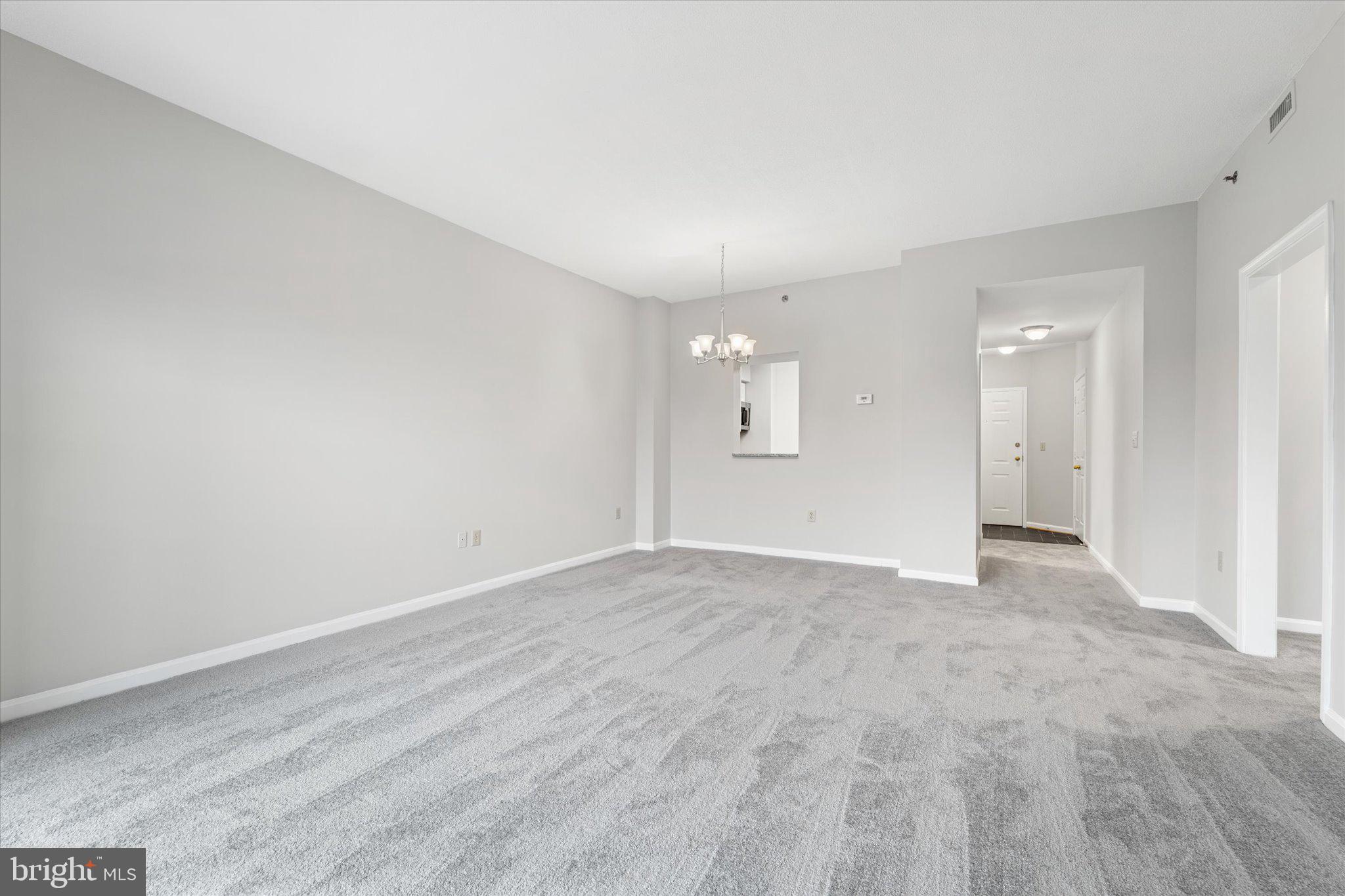545 East Braddock Road, Unit 602 Alexandria, VA 22314 - Photo 16 of 41 OPEN & SPACIOUS LIVING/DINING AREA