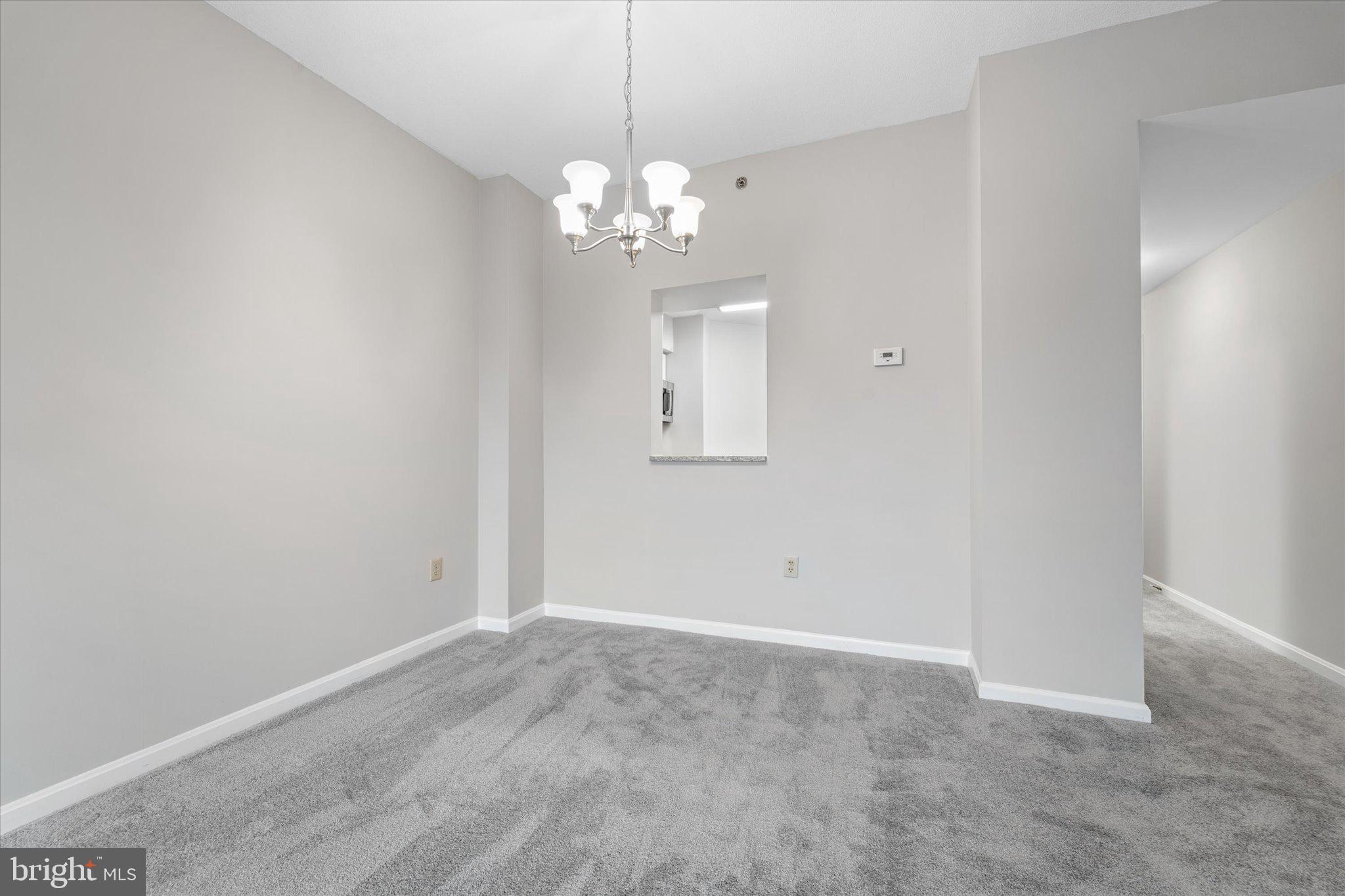 545 East Braddock Road, Unit 602 Alexandria, VA 22314 - Photo 17 of 41 KITCHEN PASS-THROUGH TO DINING AREA