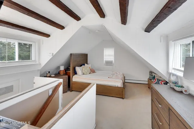 a view of living room with furniture and flat screen tv