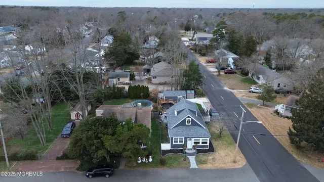 an aerial view of a house with a garden