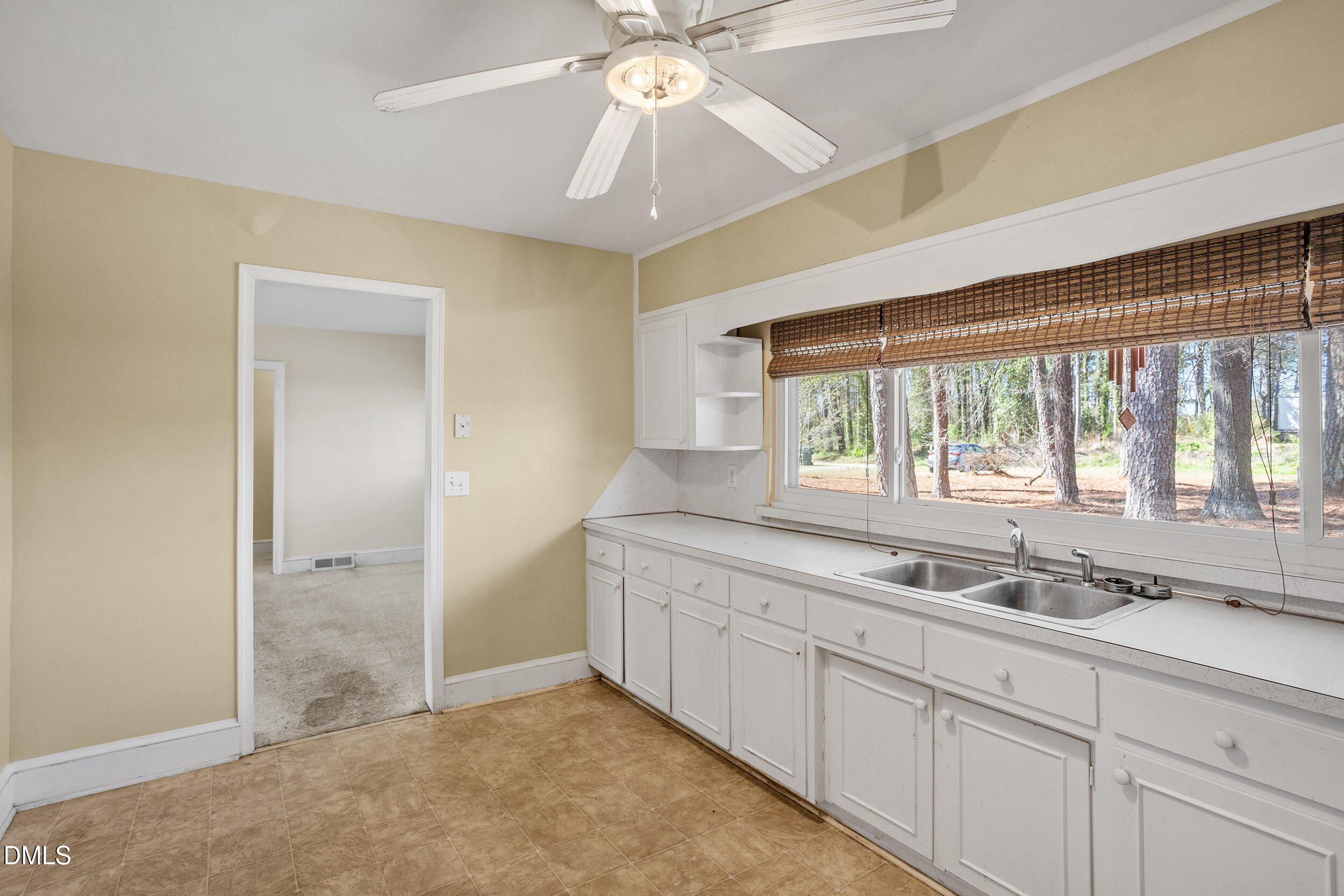 5011 Old Stage Road Raleigh, NC 27603 - Photo 17 of 29 a bathroom with a sink and a window