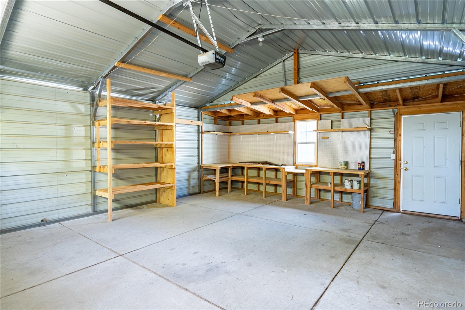 1124 Newark Street Aurora, CO 80010 - Photo 22 of 32 a view of empty room with white walls