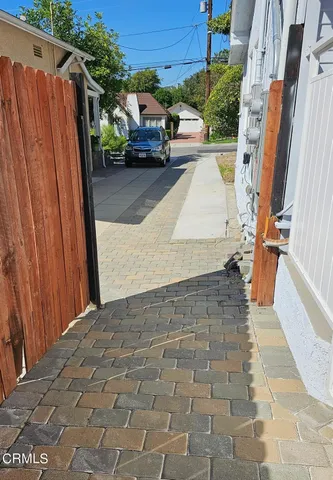a view of a street with cars