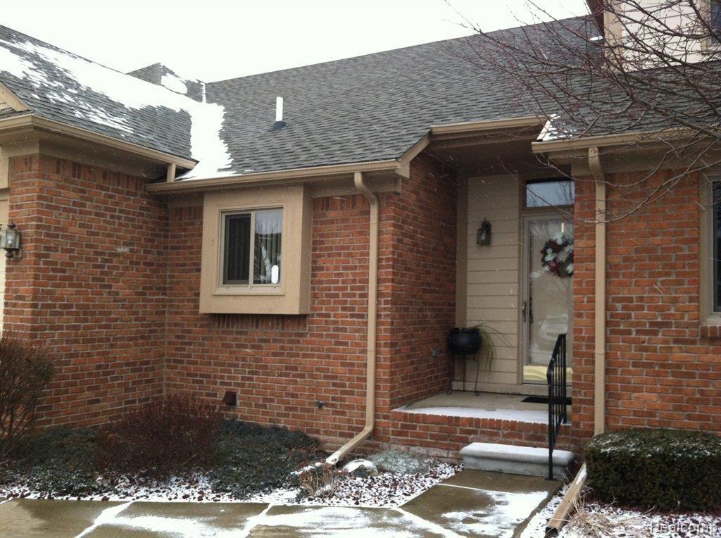16845 Country Ridge Court, Unit 80 Macomb, MI 48044 - Photo 2 of 8 Front Close.jpg