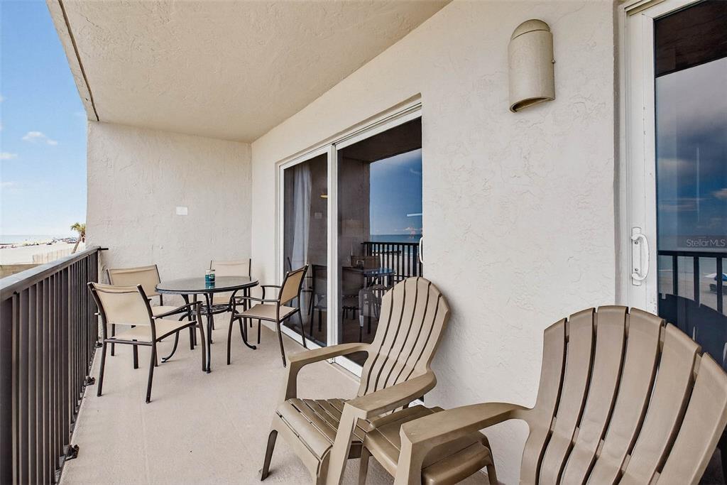 14300 Gulf Boulevard, Unit 104 Madeira Beach, FL 33708 - Photo 28 of 42 a view of a dining room with furniture