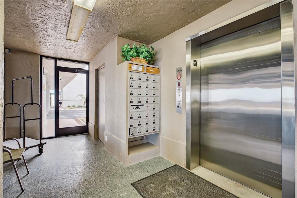 14300 Gulf Boulevard, Unit 104 Madeira Beach, FL 33708 - Photo 30 of 42 a view of a hallway with entryway