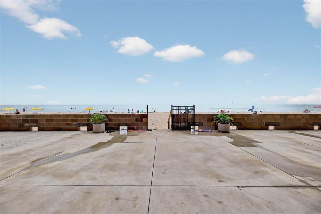 14300 Gulf Boulevard, Unit 104 Madeira Beach, FL 33708 - Photo 31 of 42 a view of a terrace with chairs