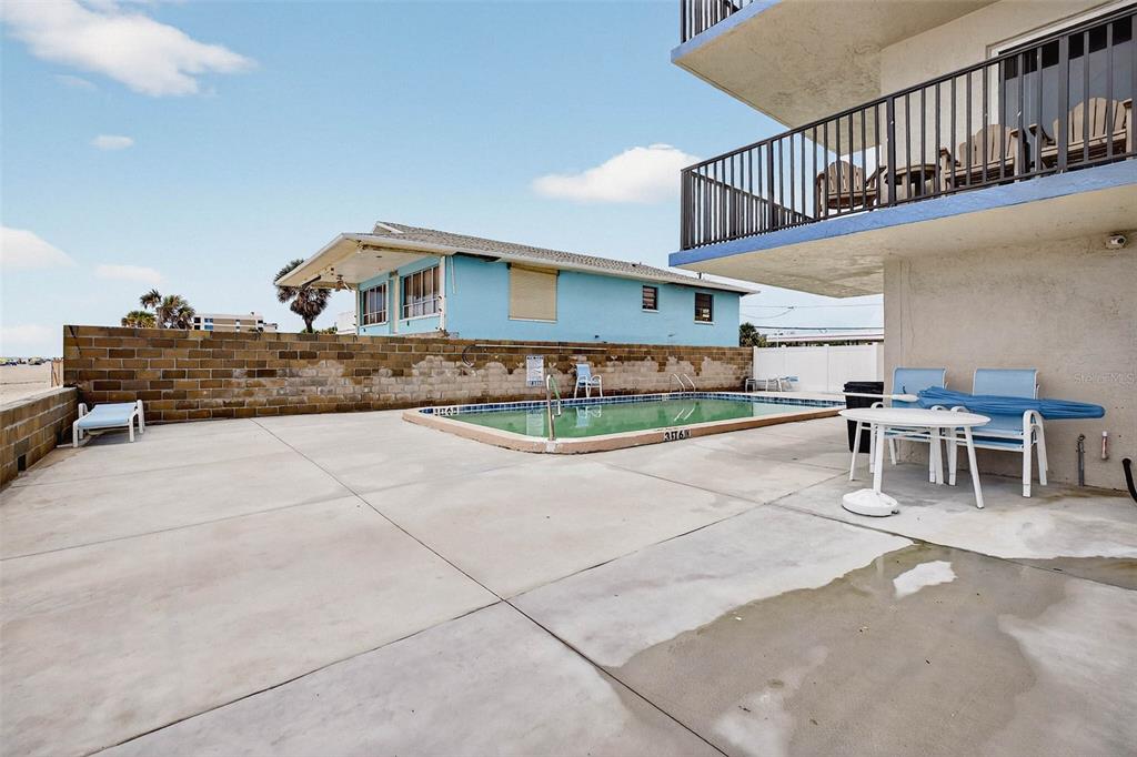 14300 Gulf Boulevard, Unit 104 Madeira Beach, FL 33708 - Photo 32 of 42 a view of a house with sitting area