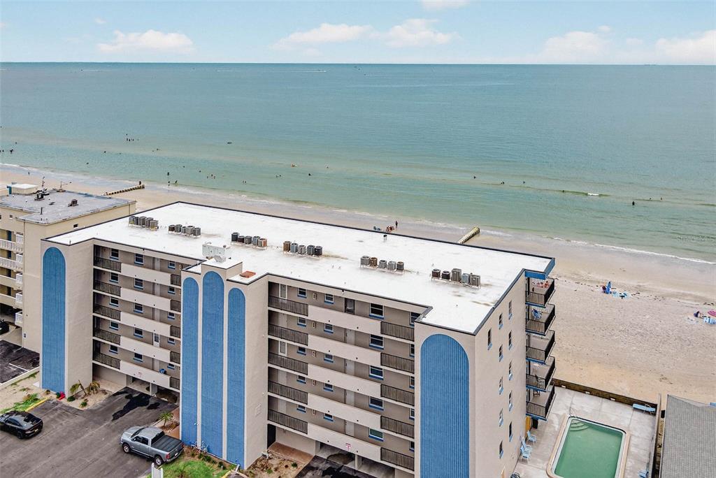 14300 Gulf Boulevard, Unit 104 Madeira Beach, FL 33708 - Photo 41 of 42 a utility room with dryer and washer