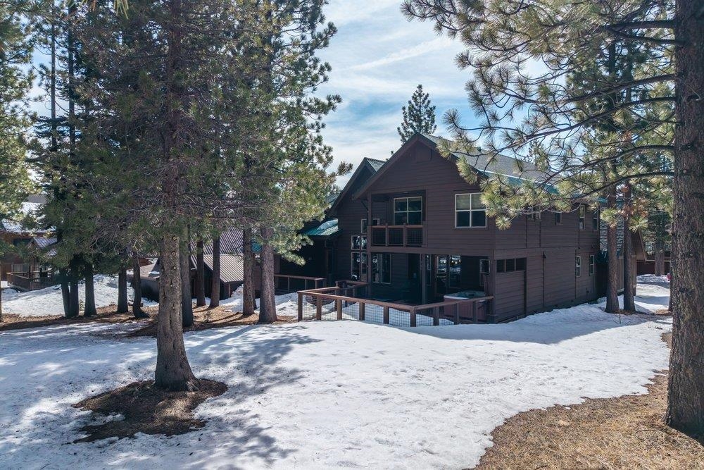 15043 Wolfgang Road Truckee, CA 96161 - Photo 28 of 28 a view of a house with a snow in the yard
