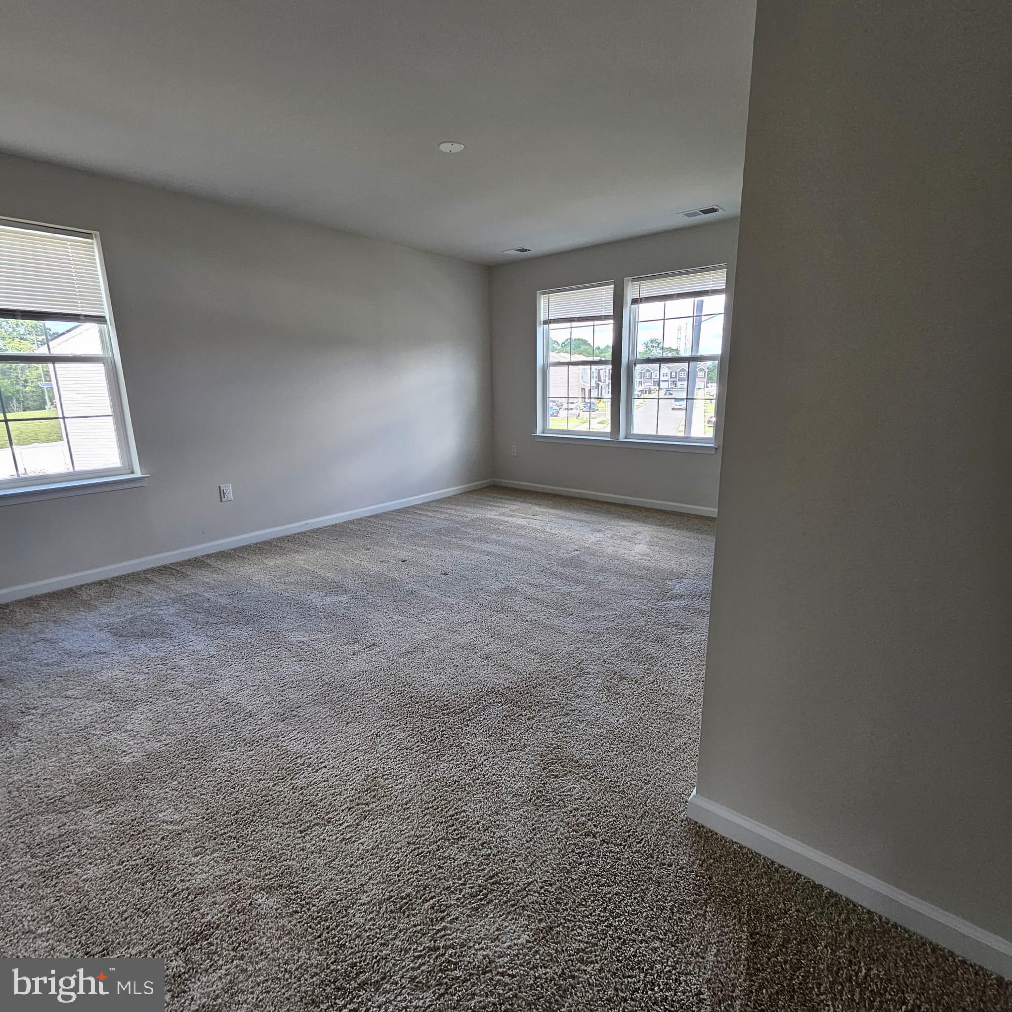 38 Peregrine Way Burlington, NJ 08016 - Photo 17 of 34 an empty room with windows