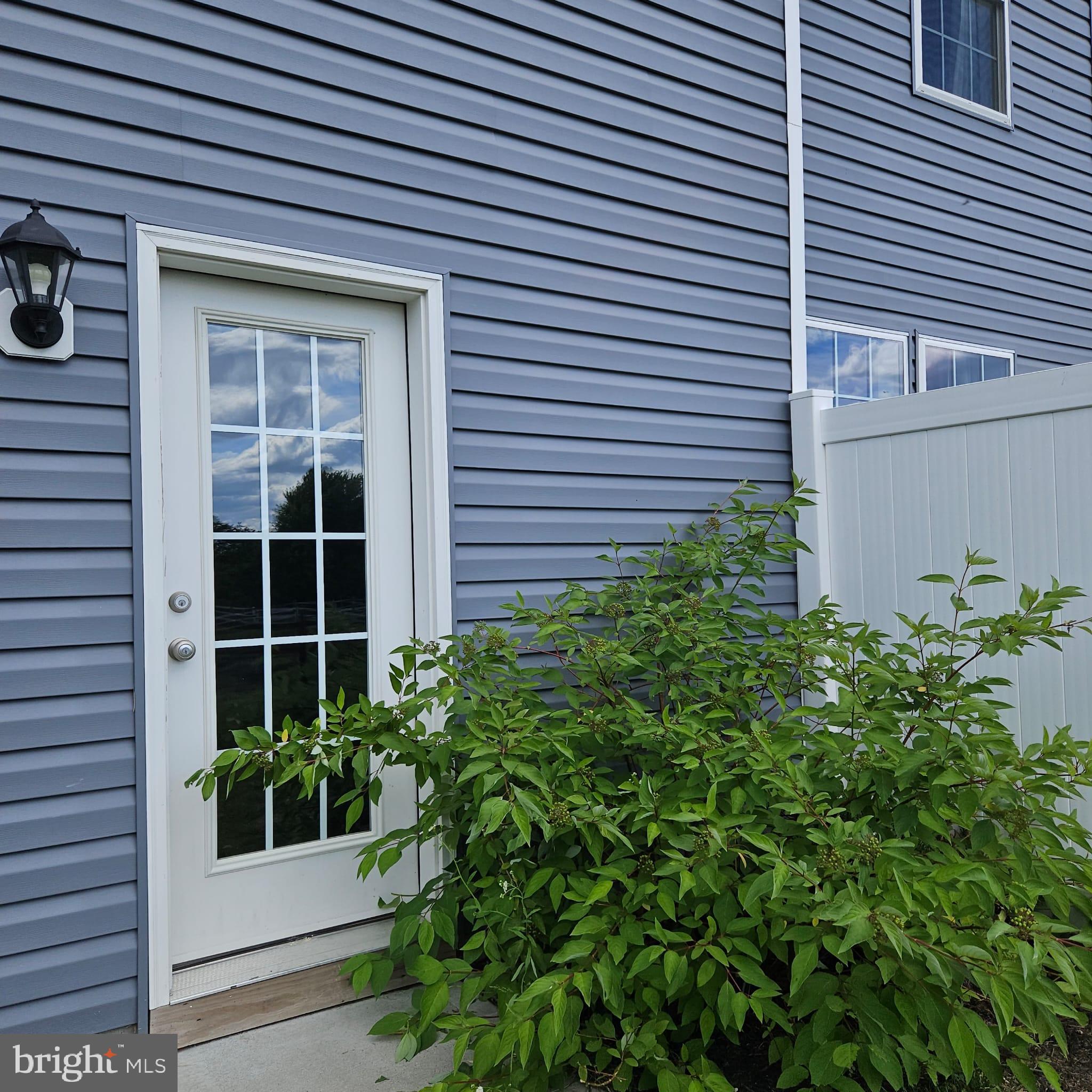 38 Peregrine Way Burlington, NJ 08016 - Photo 23 of 34 a view of front door and potted plants
