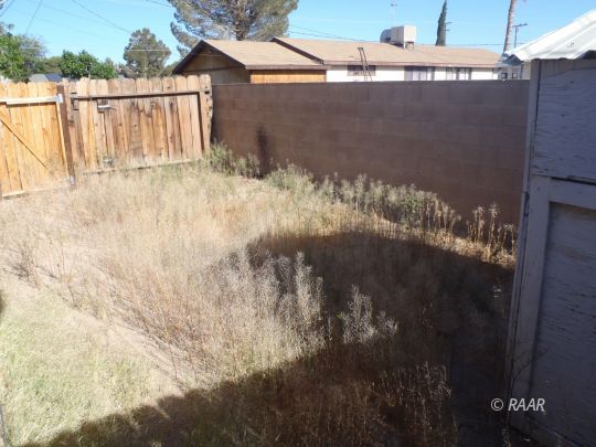 837 Commercial Ridgecrest, CA 93555 - Photo 8 of 8 a view of a backyard of the house