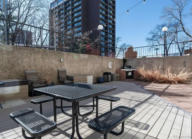 a view of a backyard with furniture