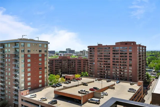 a view of a city with tall buildings