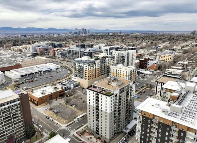 an aerial view of a city with lots of residential buildings