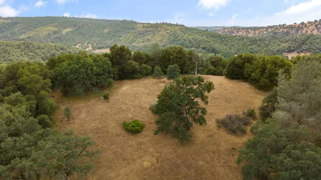 a view of a lake with mountains in the background