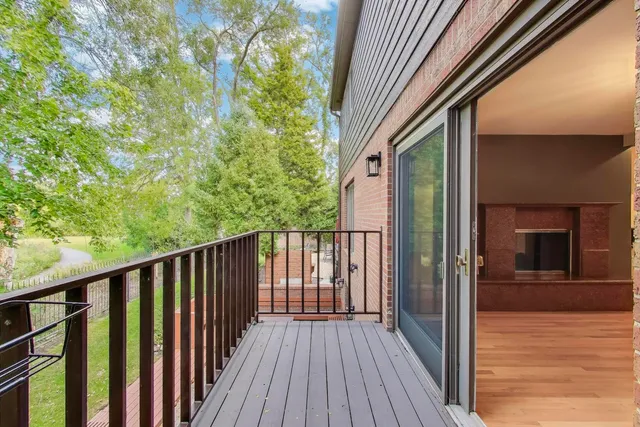 a view of balcony with wooden floor