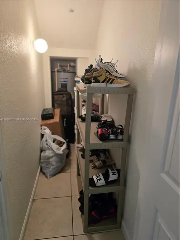 a view of a closet and storage