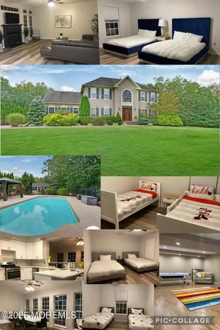 a view of a house with a yard and sitting area