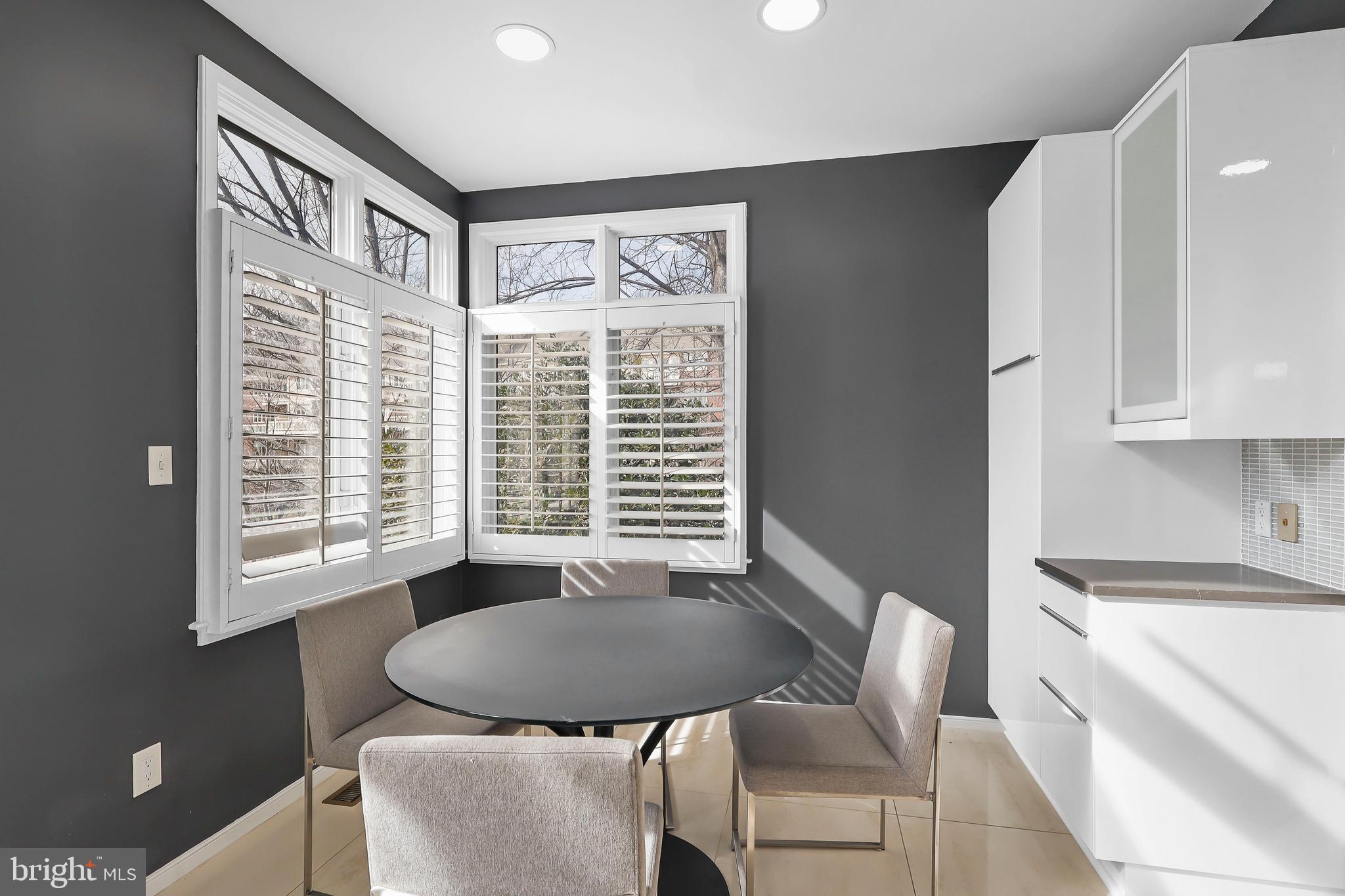 1460 Waterfront Road Reston, VA 20194 - Photo 17 of 63 a view of a dining room with furniture and a window