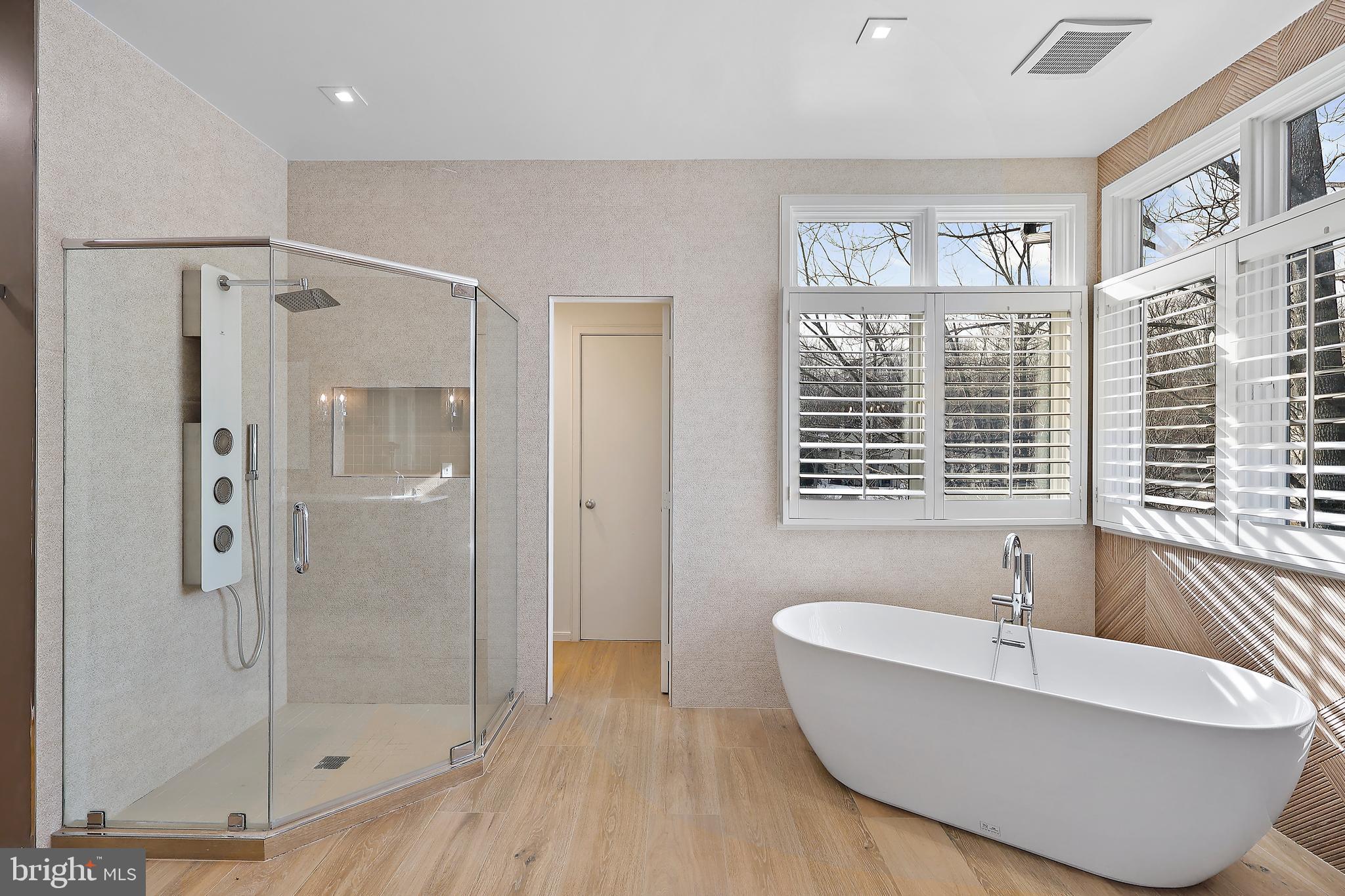 1460 Waterfront Road Reston, VA 20194 - Photo 29 of 63 a bathroom with a bathtub and a shower