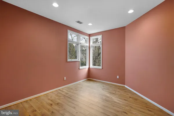 a bathroom with a sink mirror toilet and bathtub