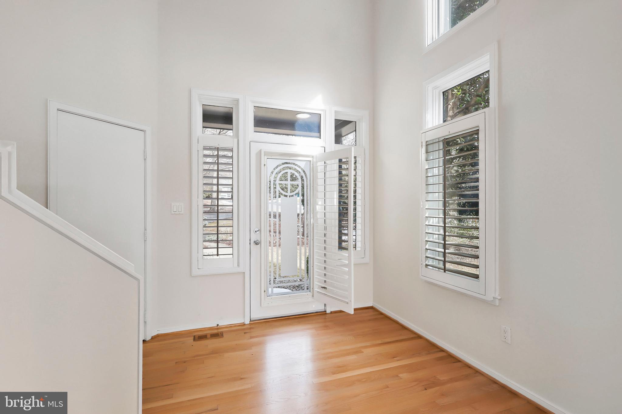 1460 Waterfront Road Reston, VA 20194 - Photo 4 of 63 a view of livingroom with hardwood