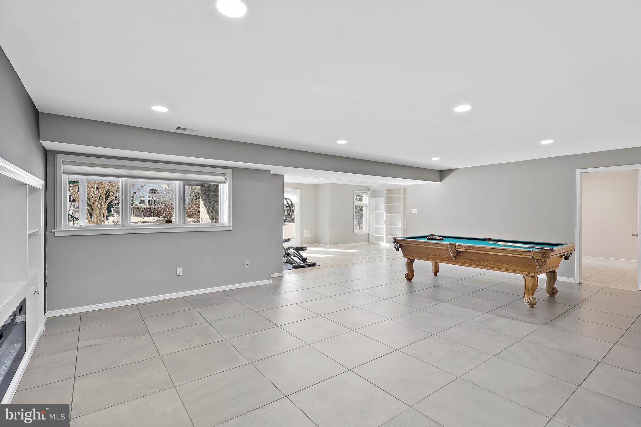 1460 Waterfront Road Reston, VA 20194 - Photo 45 of 63 a living room with furniture and a table