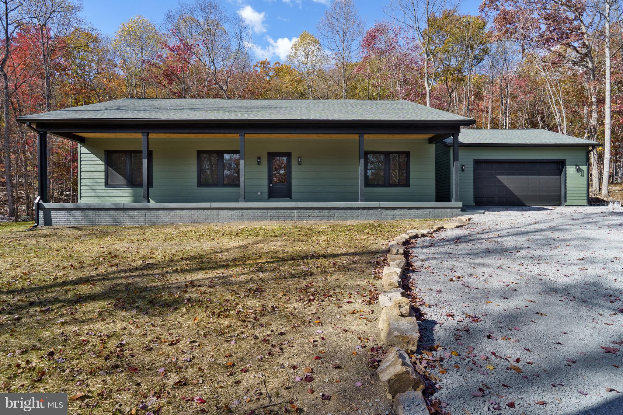 89 Parkside Terrace Berkeley Springs, WV 25411 - Photo 1 of 32 a front view of a house
