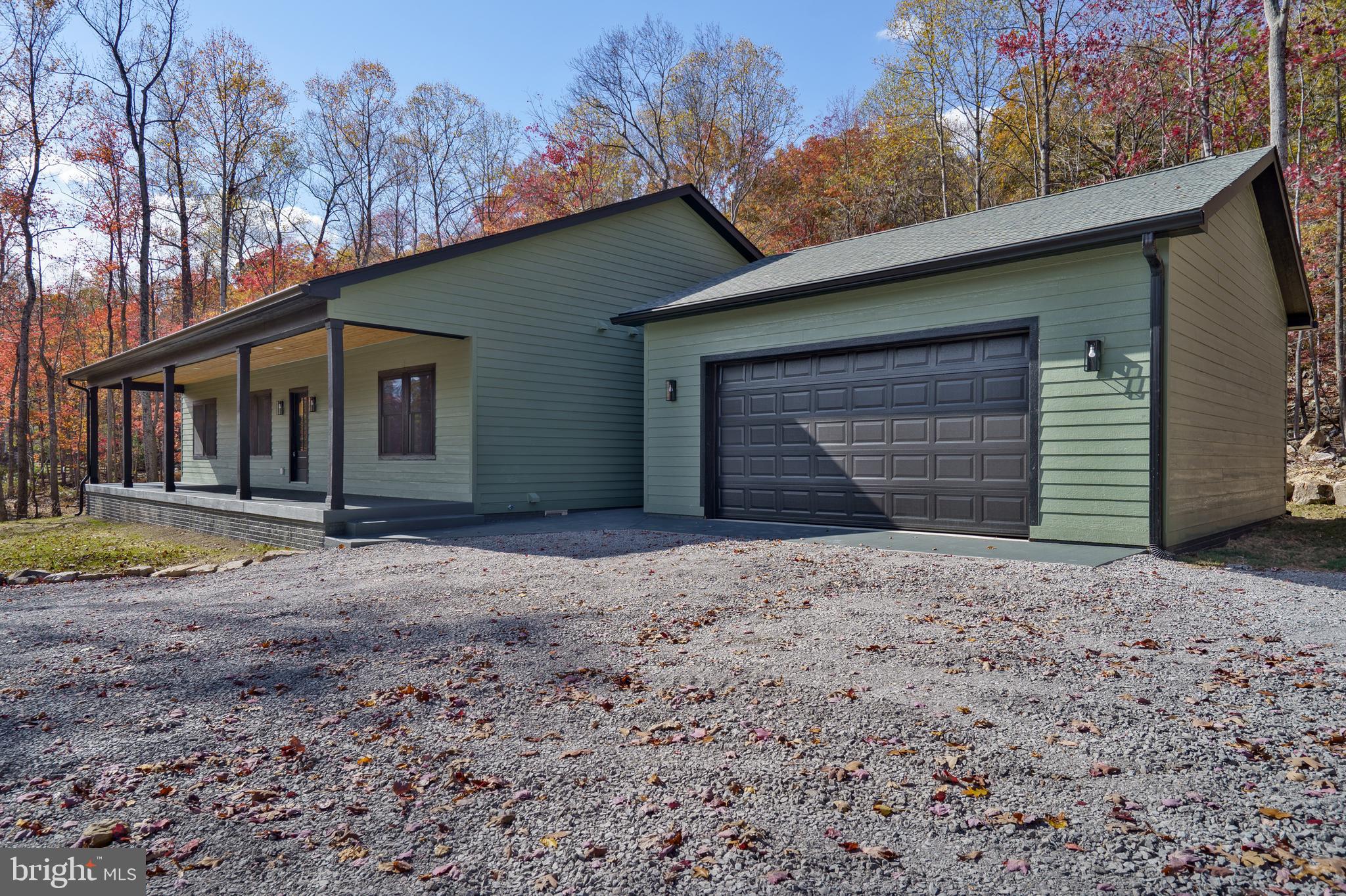 89 Parkside Terrace Berkeley Springs, WV 25411 - Photo 32 of 32 a house with trees in the background