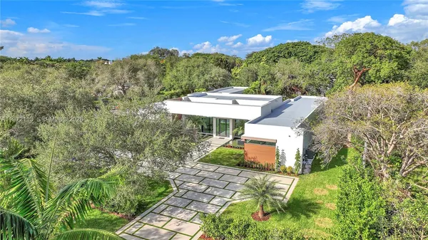 a house view with a garden space