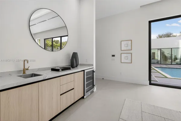 a bathroom with a bathtub and shower