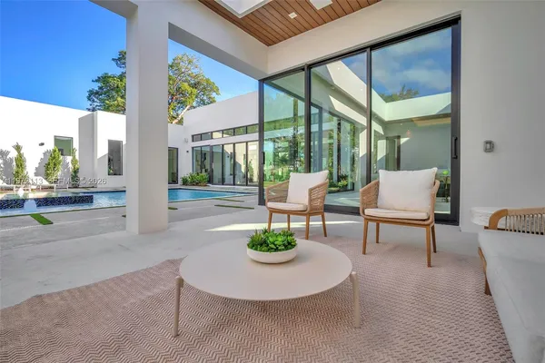 a view of a big yard with a house