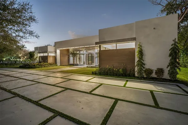 a house view with a garden space