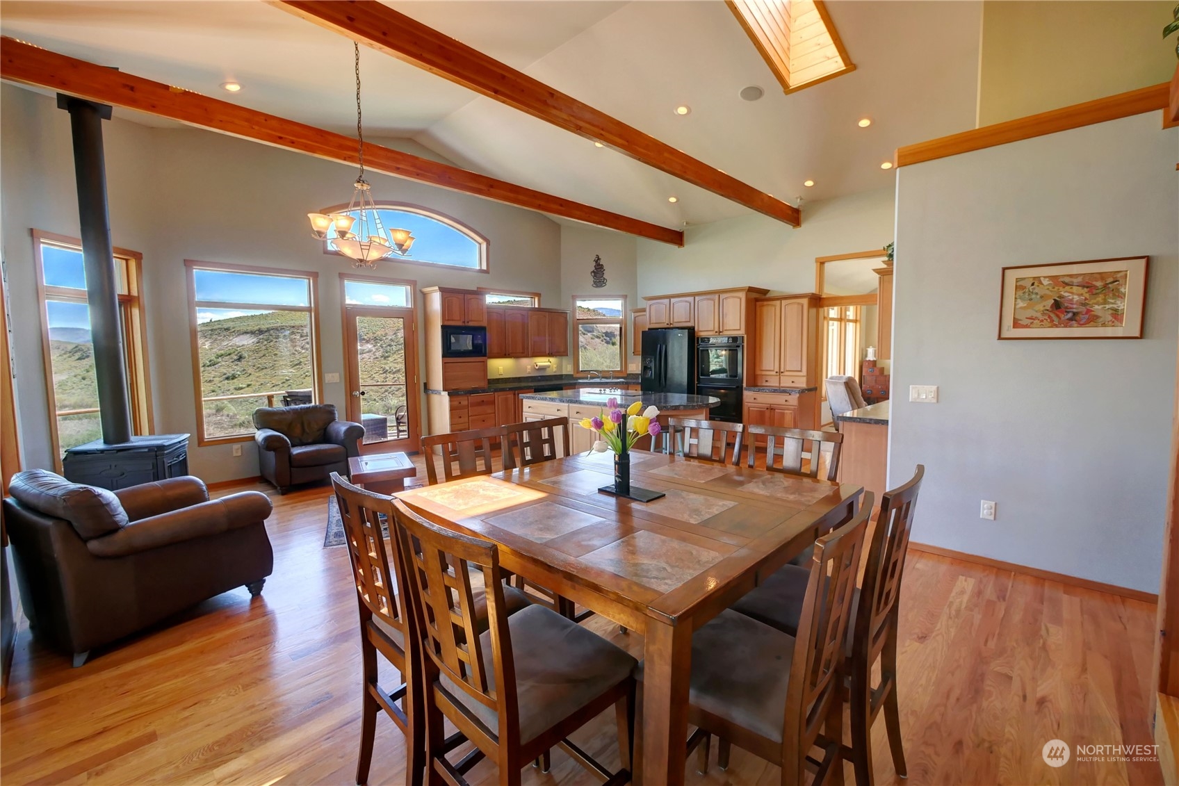 20 Blue Heron Lane Riverside, WA 98849 - Photo 13 of 40 a view of a dining area with furniture and wooden floor