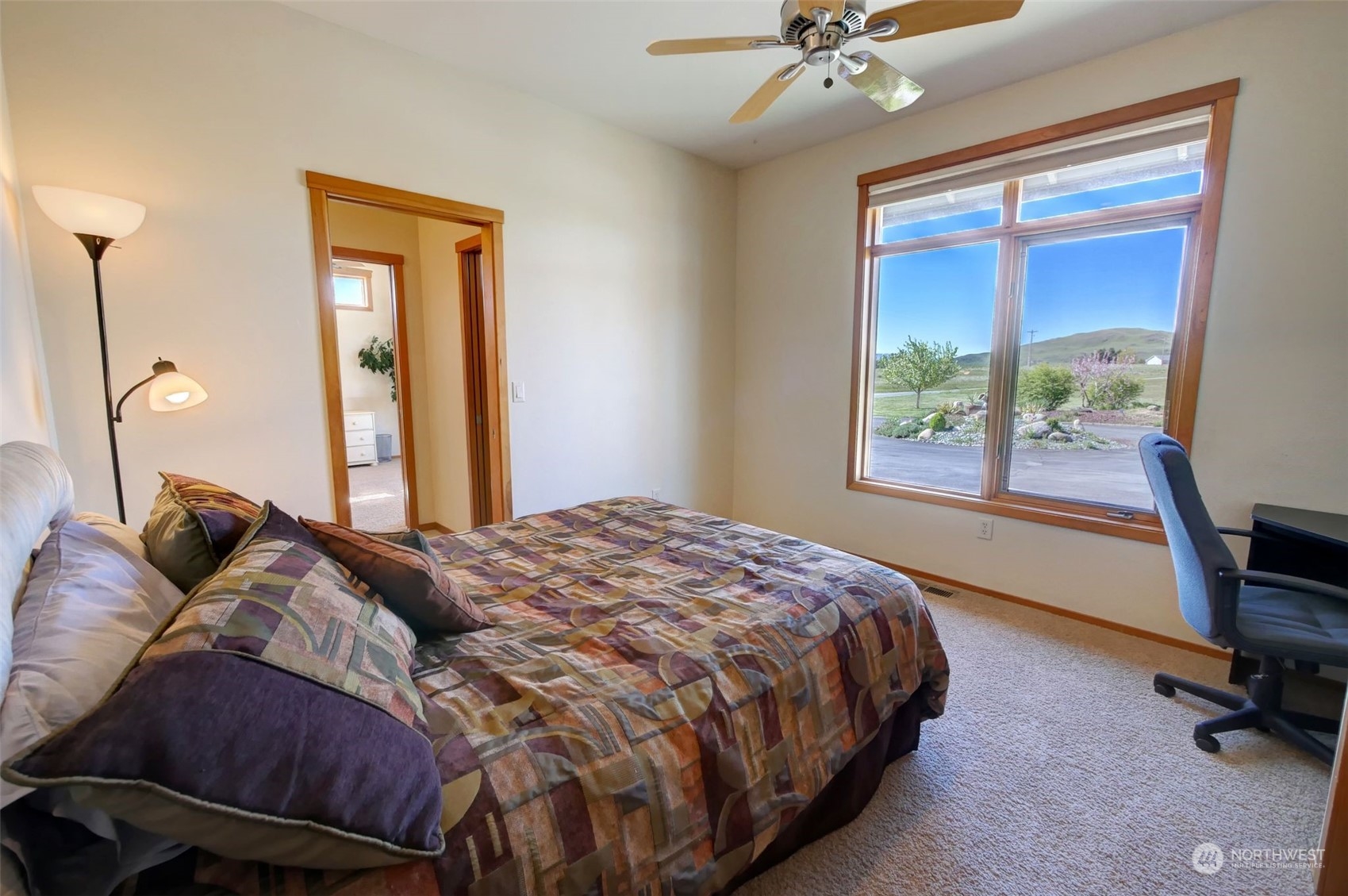 20 Blue Heron Lane Riverside, WA 98849 - Photo 18 of 40 a bedroom with a bed and a window