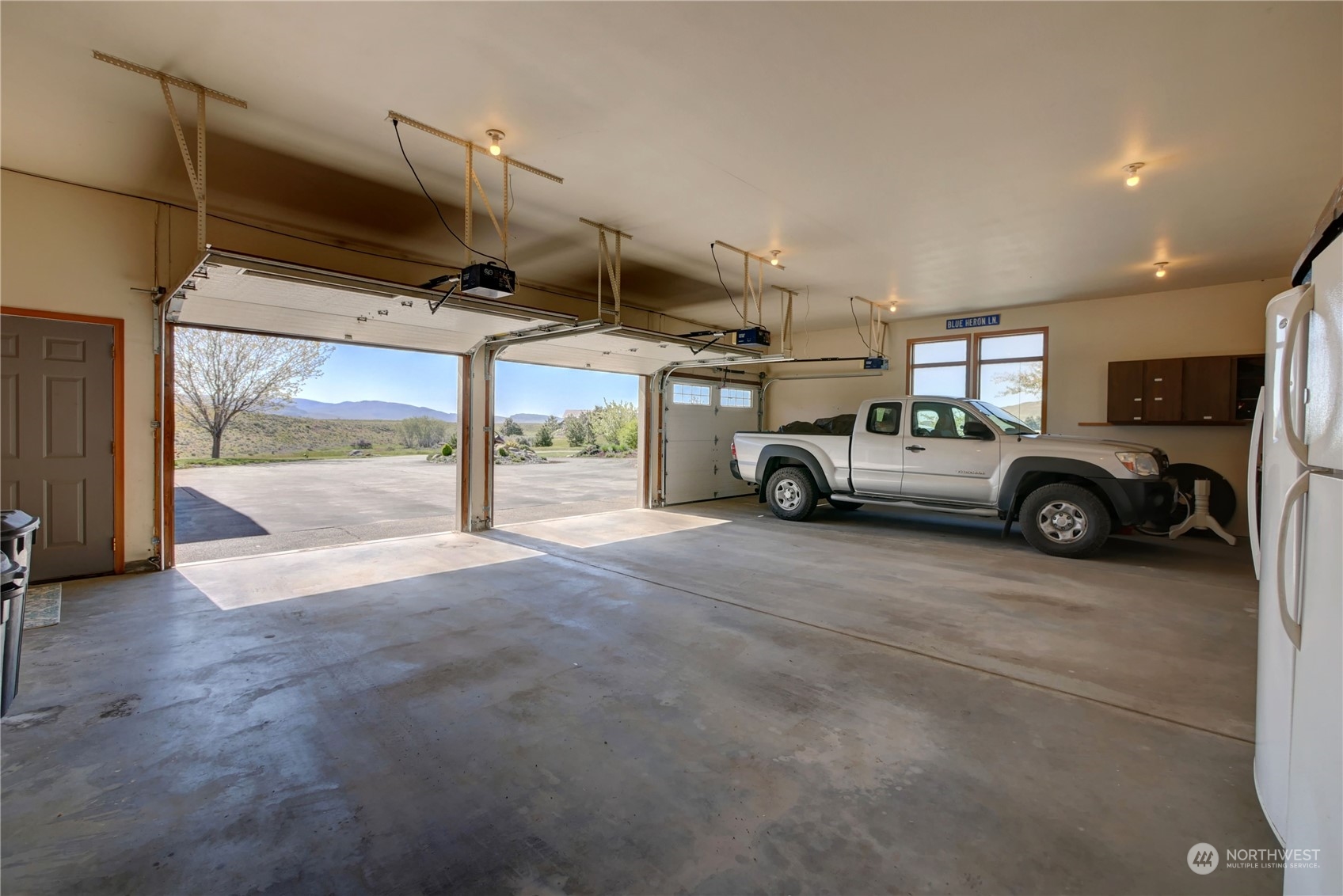 20 Blue Heron Lane Riverside, WA 98849 - Photo 22 of 40 a view of a car garage door