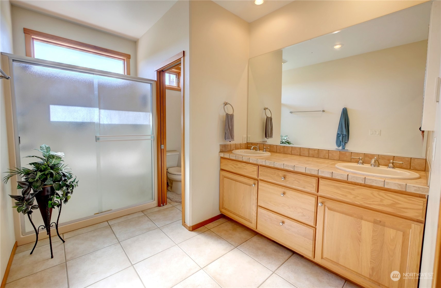 20 Blue Heron Lane Riverside, WA 98849 - Photo 25 of 40 a bathroom with a granite countertop sink a potted plant and a mirror