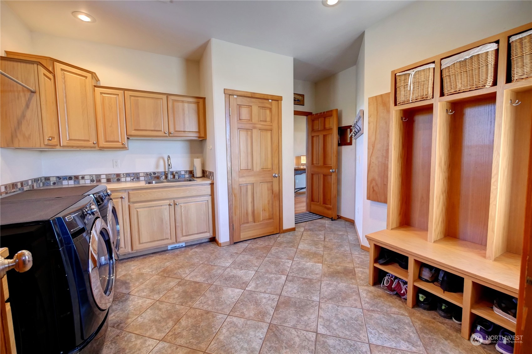 20 Blue Heron Lane Riverside, WA 98849 - Photo 30 of 40 a view of a kitchen with refrigerator and cabinets
