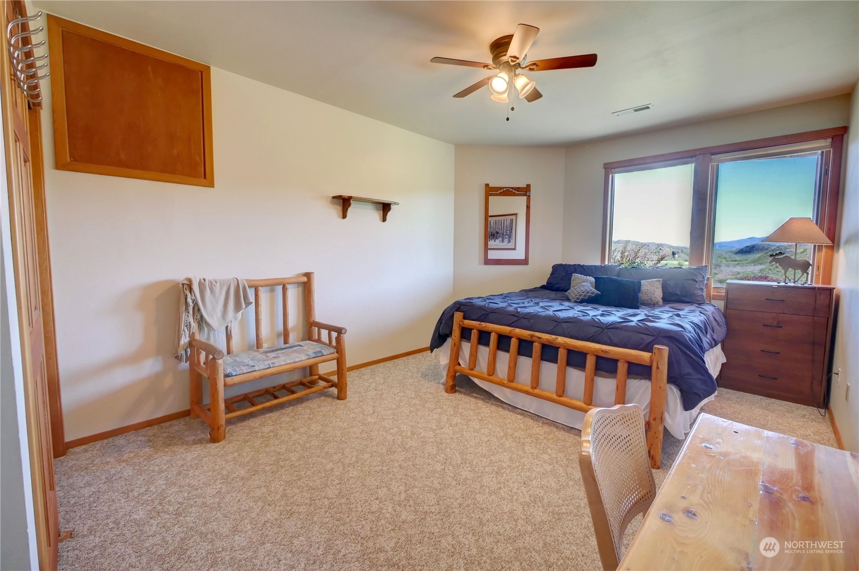 20 Blue Heron Lane Riverside, WA 98849 - Photo 31 of 40 a bedroom with furniture and a window
