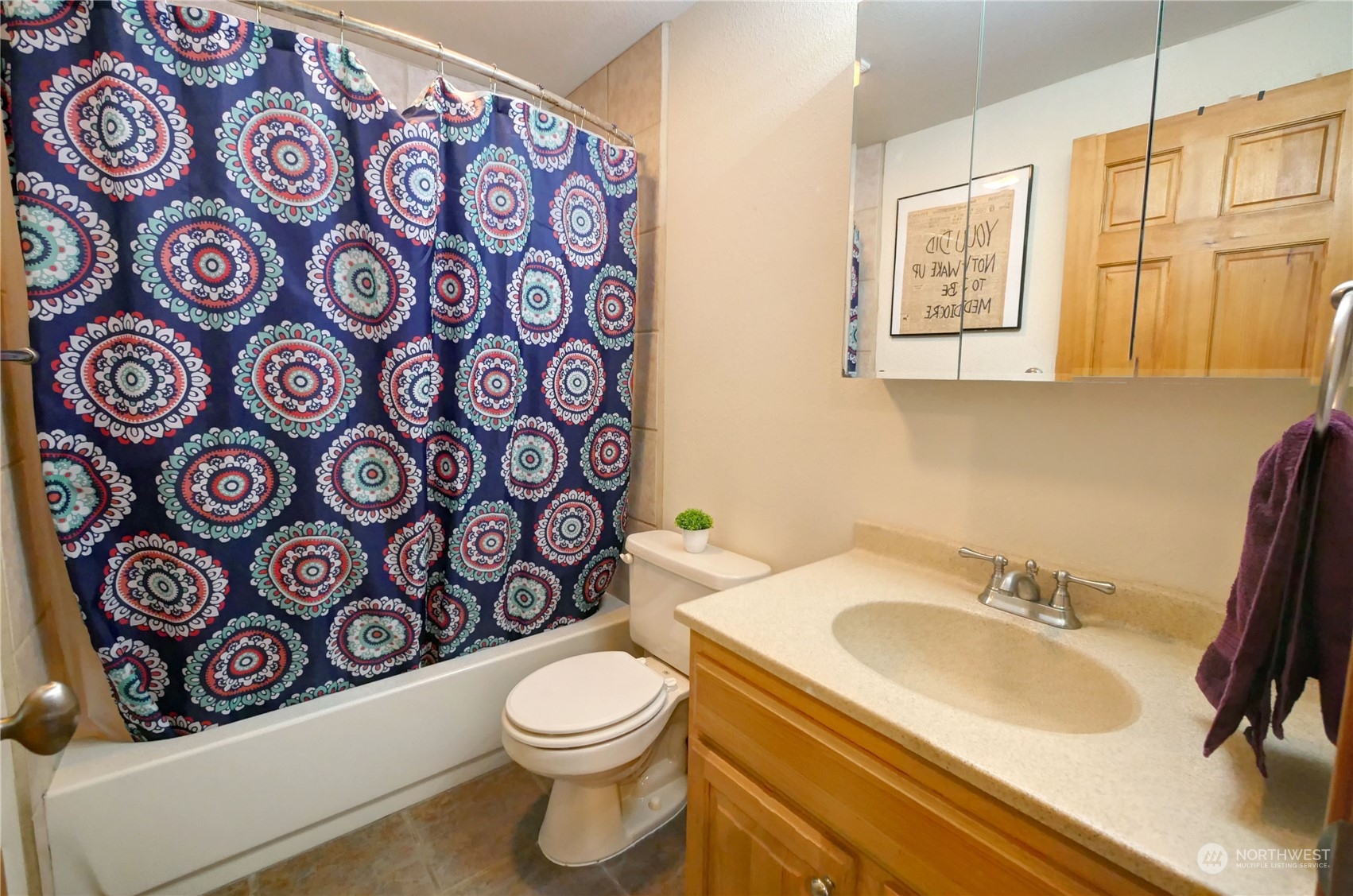 20 Blue Heron Lane Riverside, WA 98849 - Photo 32 of 40 a bathroom with a sink and mirror with toilet