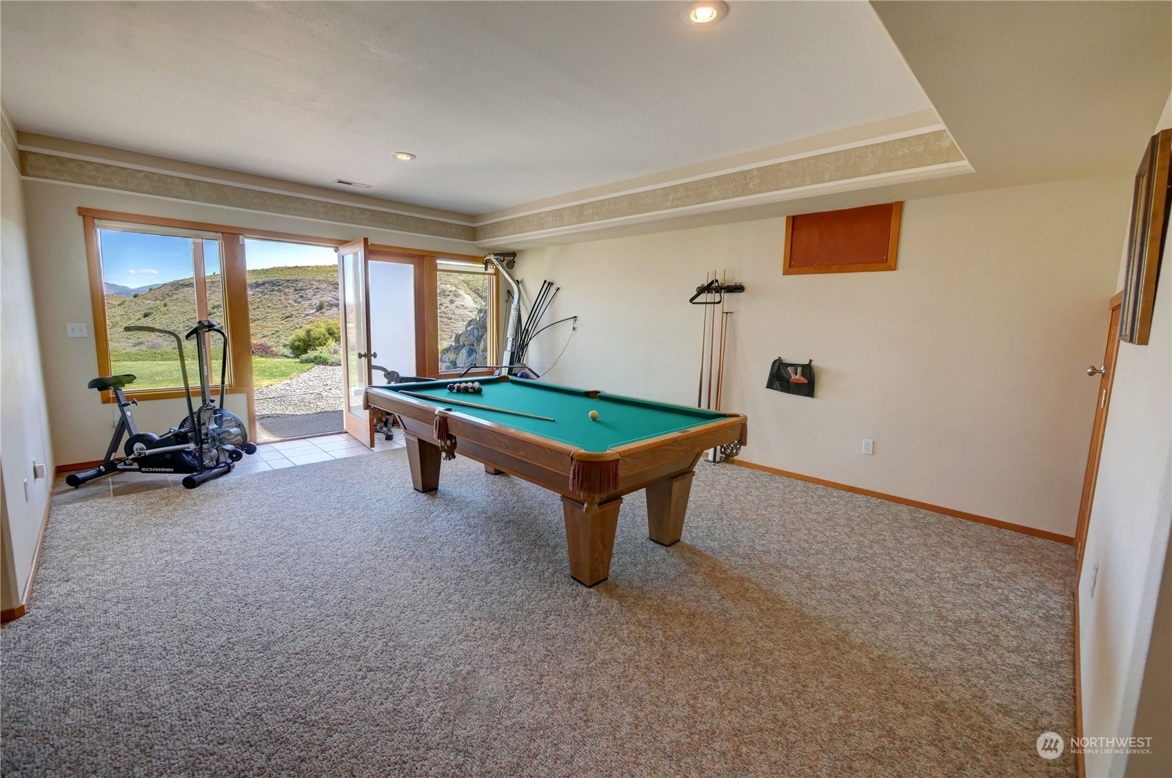 20 Blue Heron Lane Riverside, WA 98849 - Photo 33 of 40 a bedroom with furniture and a large window