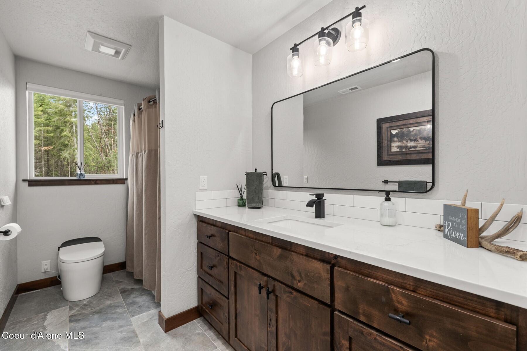 5240 Vay Road Priest River, ID 83856 - Photo 14 of 24 014_24webormlsBathroom