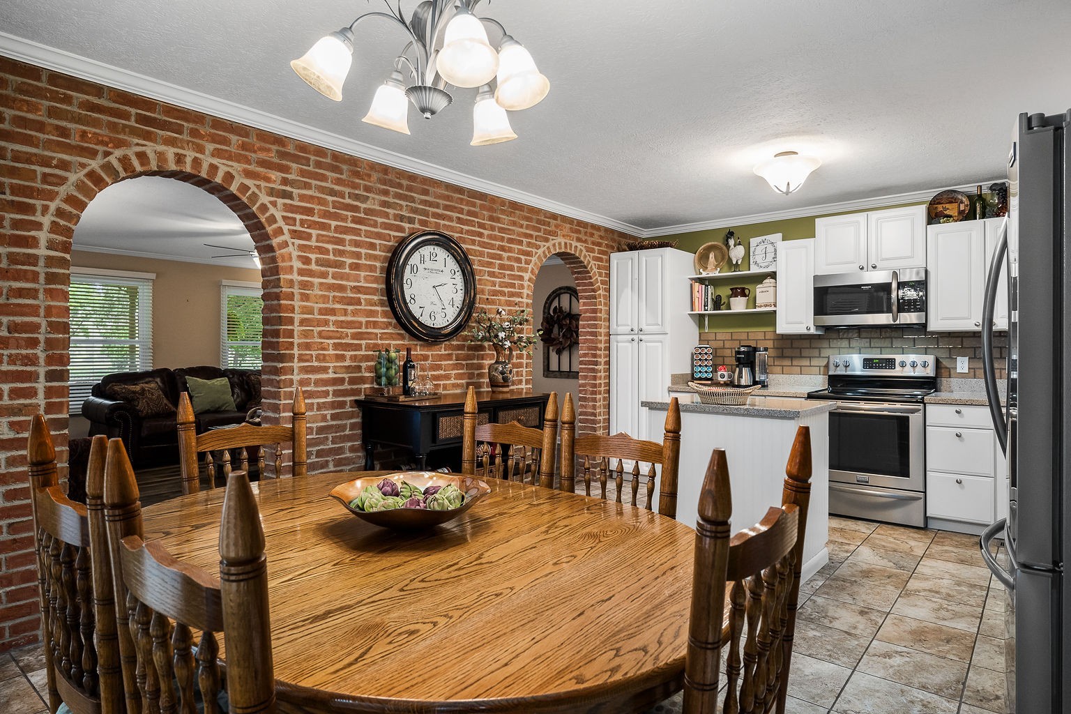 715 Old Rock Island Road Rock Island, TN 38581 - Photo 11 of 48 a kitchen with a table chairs and a stove