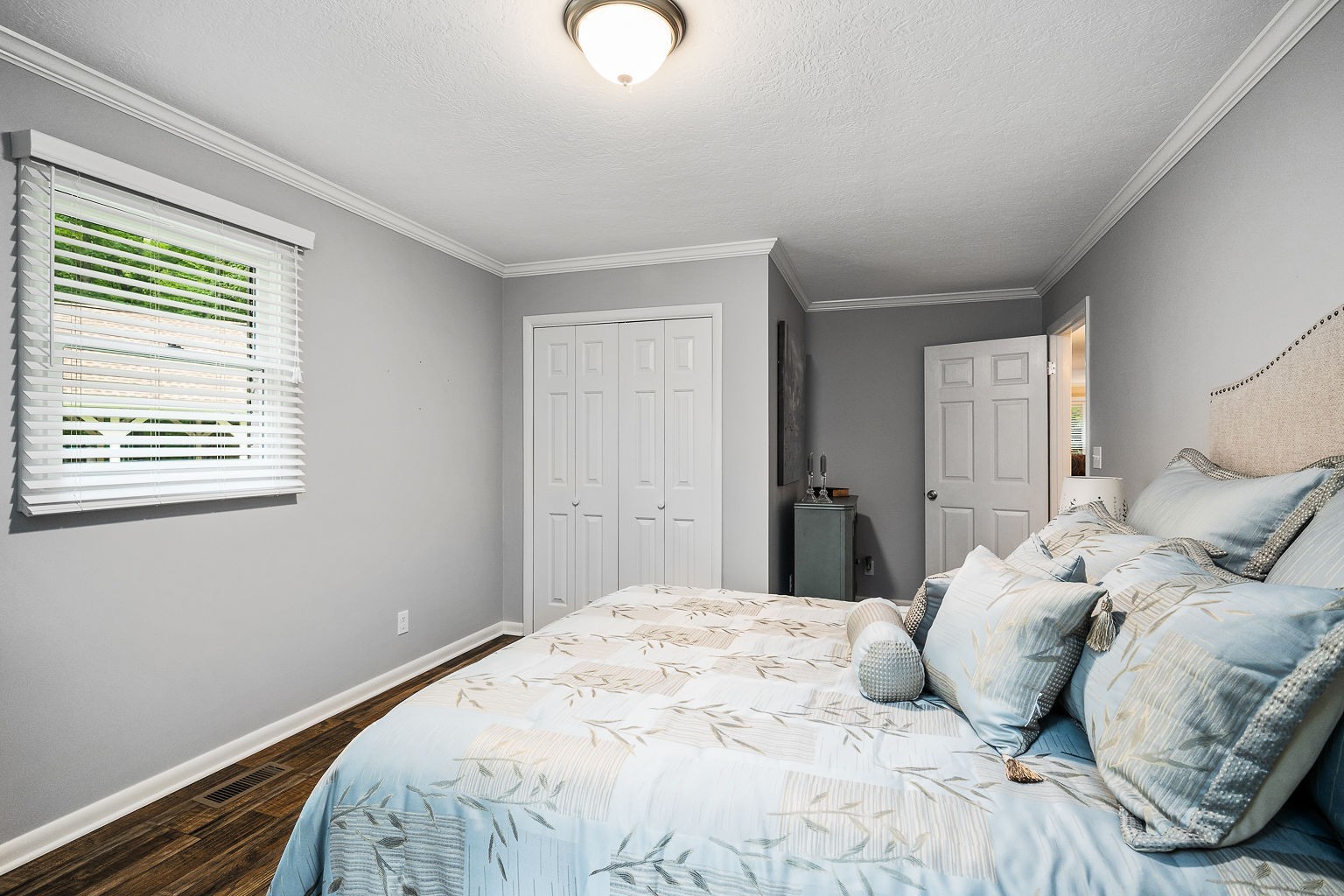 715 Old Rock Island Road Rock Island, TN 38581 - Photo 21 of 48 a bedroom with a bed and a window
